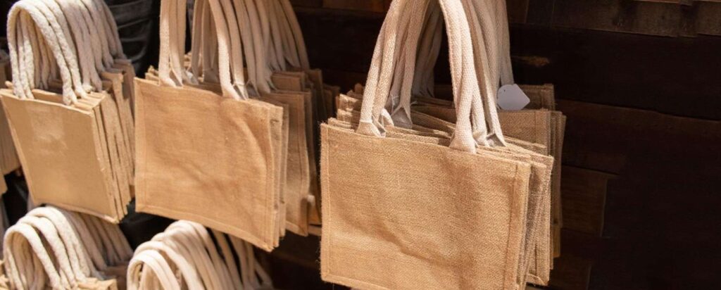 Stylish eco-friendly tote bags made of jute and cotton fabric